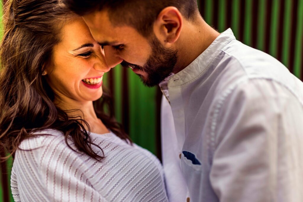 pexels-photo-6755995-6755995 Close-up of a happy couple laughing and embracing outdoors in Toledo, Spain.